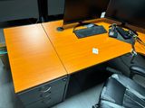 an image of a desk with two monitors and a keyboard