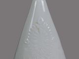 a white vase with a crown on the top of it