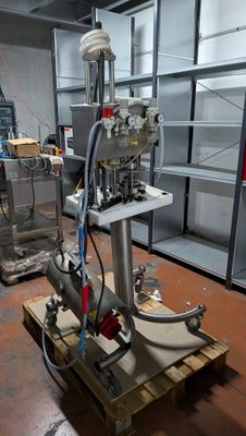a machine that is sitting on a pallet in a warehouse