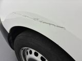 a close up of a car ' s tire with a sticker on it