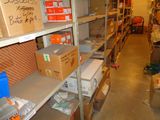 many boxes and boxes on the shelves in the room