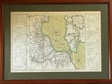 a picture of a map hanging on a wall