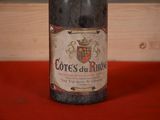 a bottle of wine that is sitting on a table
