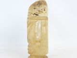 a small statue of a man made out of ice cream