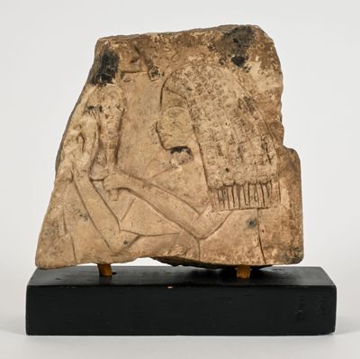 an image of a stone block with a face on it