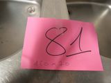 a pink sticker with the number 844 on it