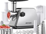 an image of a meat grinder with meat and vegetables on it
