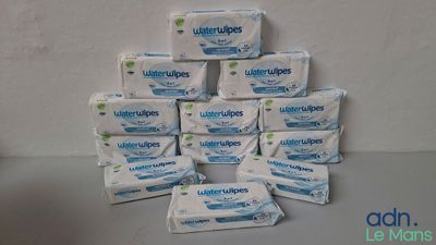 several packs of wet wipes stacked on top of each other