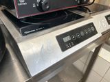 a stove top with a stove top oven on top of it