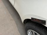a close up of a car with a sticker on the side of it