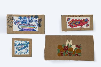 four cards with drawings of flowers and birds on them on a white surface