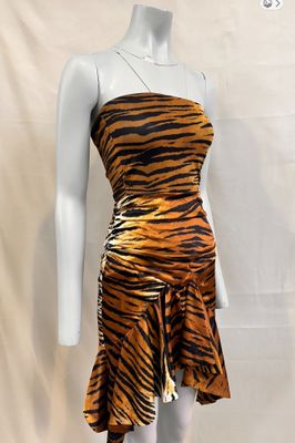 the mannequin is dressed in a tiger print dress