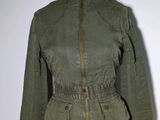 an image of a green jacket on a mannequin mannequin mannequin mannequin mannequin mannequin mannequin mannequin