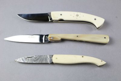 three different types of knives that are on the table