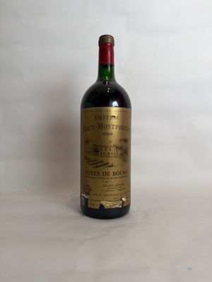 a bottle of wine that is sitting on a table