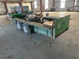 an image of a truck with a trailer in a warehouse