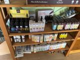 a shelf with various bottles of alcohol on it