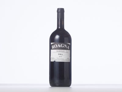 a bottle of wine that is sitting on a table