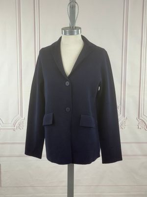 a close up of a black jacket on a mannequin dummy