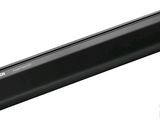 a close up of a long black object on a white background