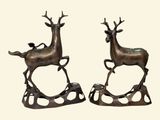 pair of bronze deer bookends on a white background