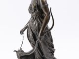 an image of a statue of a woman with a cat