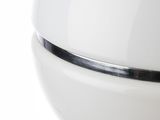 a white toilet bowl with a chrome lid