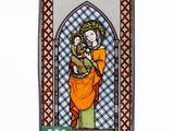 an image of a stained glass window with a woman holding a child