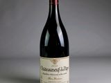 a bottle of wine that is sitting on a table