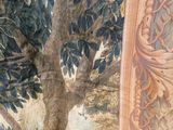 a picture of a painting of a tree and a bench
