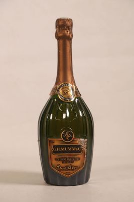 a bottle of champagne that is sitting on a table