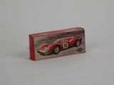 a box with a toy car on it on a white surface