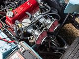 a close up of a car engine with a red filter