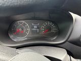 a close up of a car dashboard with a speedometer and gauges