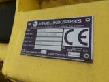 a sign on the side of a yellow machine