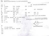 une image montrant un gros plan d'un document sur lequel figure la photo d'une personne