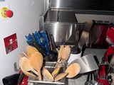 pots and pans are sitting on a counter in a kitchen