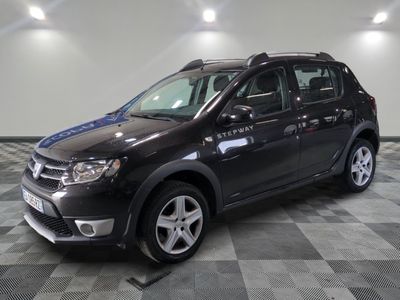 a picture of a black car parked in a garage