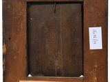 an old wooden picture frame with a piece of paper taped around it