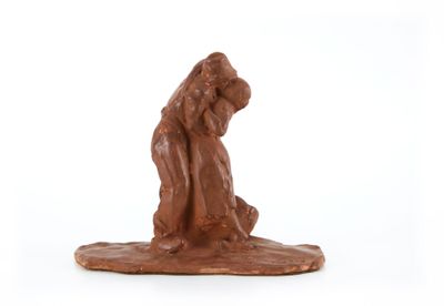 a chocolate figurine of a man and a dog