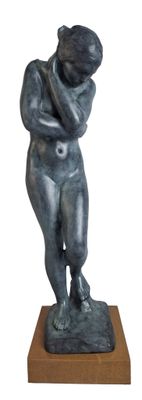 statue of a man holding his head in his hands