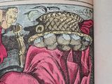 an old book with a picture of a man and a woman on it
