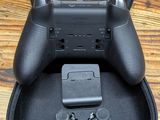 a game controller in the case on the floor