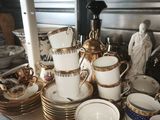 a table with a lot of plates and cups on it