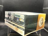 a clear box with a black and yellow label on it