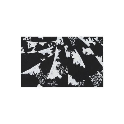 the black and white image shows a black and white pattern with white flowers