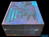 a close up of a box of pokemon trading cards on a black background