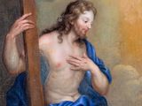 an image of a painting of a man holding a cross