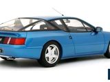 the blue car is parked on a white surface with a white background