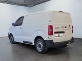 a white van that is parked in a room